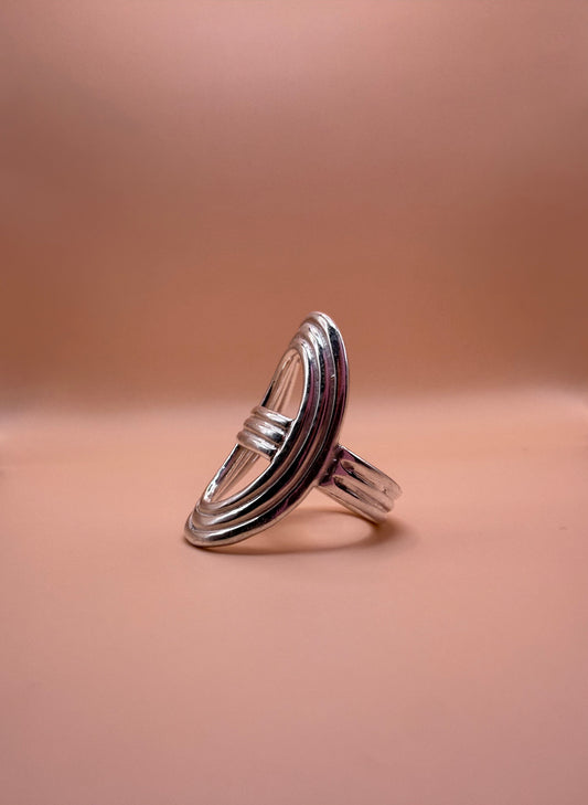 shield ring on pink background